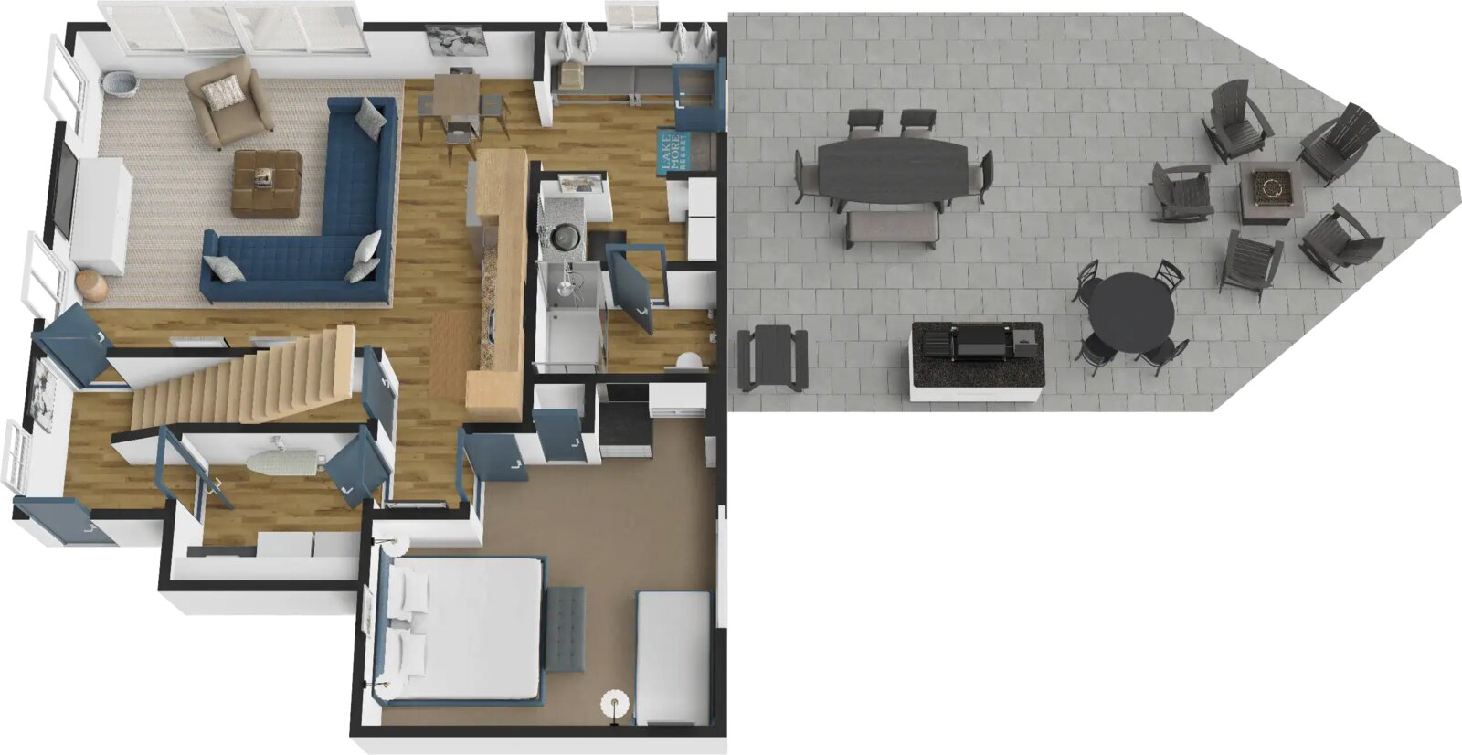 Three-dimensional floor plan of the lower level: a second living room, a second dining table, a kitchenette, a bathroom, a bedroom and the lakeside patio.